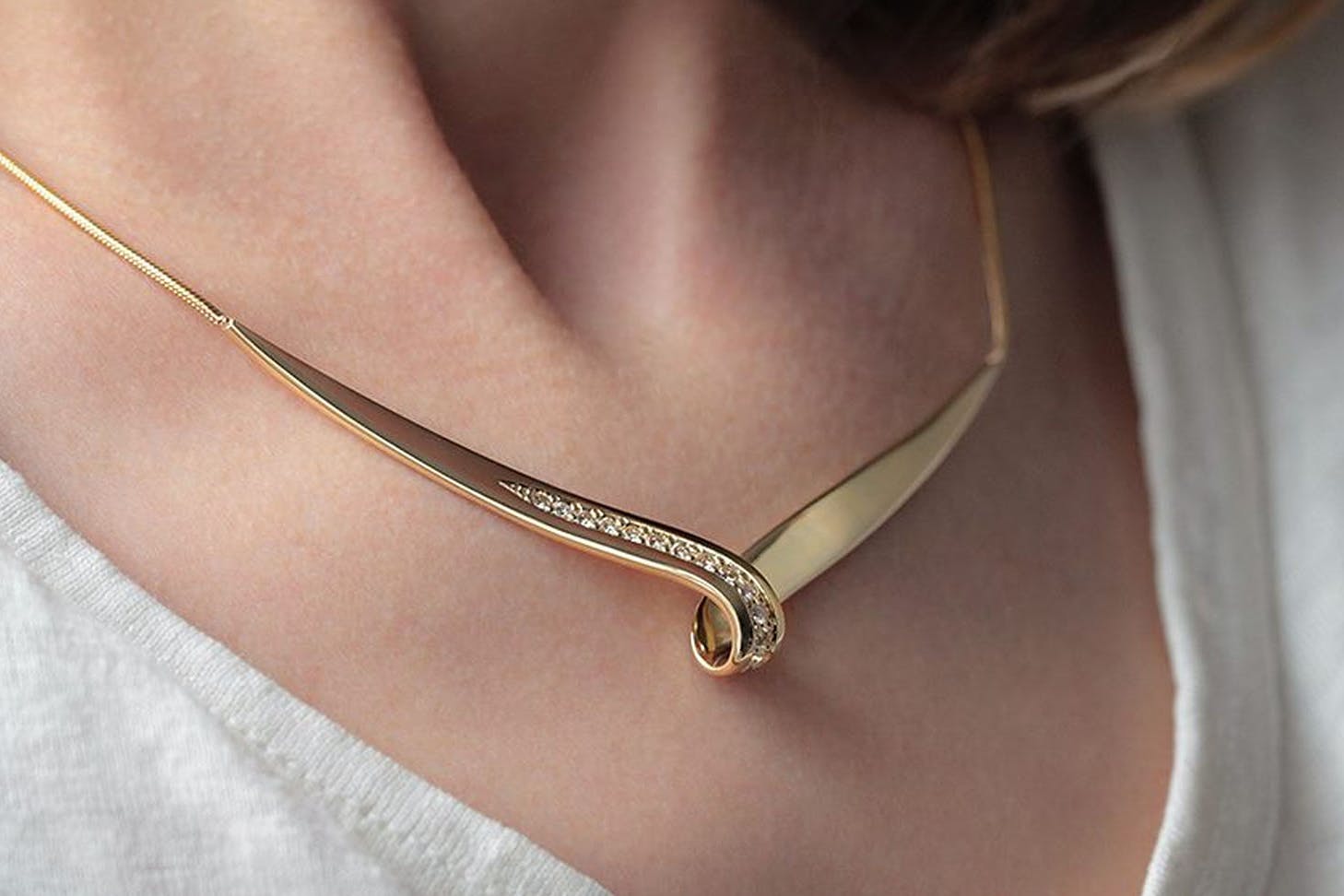 Someone wears a beautiful piece from The Rolling Mill in Wellington, one of the best jewellers in New Zealand.